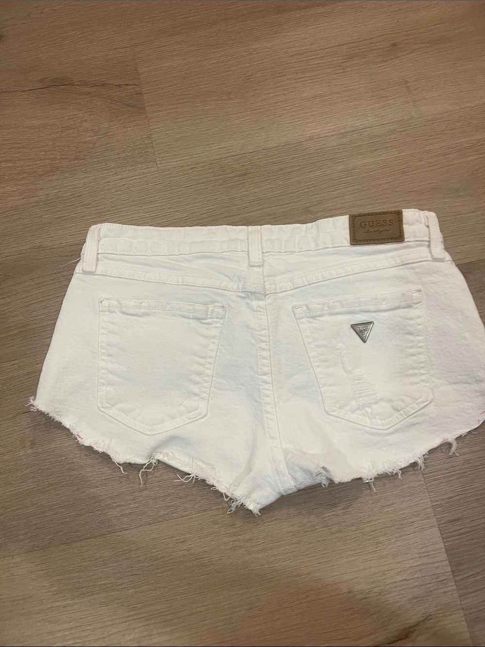 GUESS White low rise jean shorts